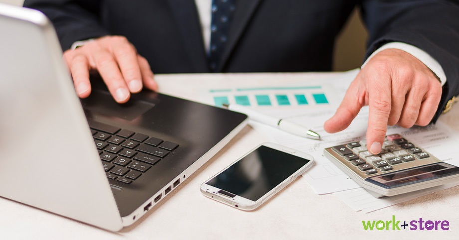 Businessman Calculating Business Expense