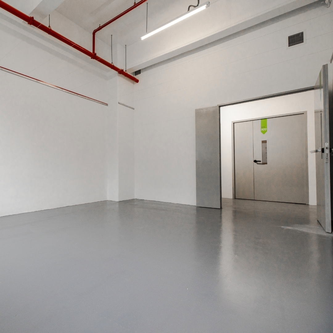 Modern silver composite flooring and ceiling with concrete.